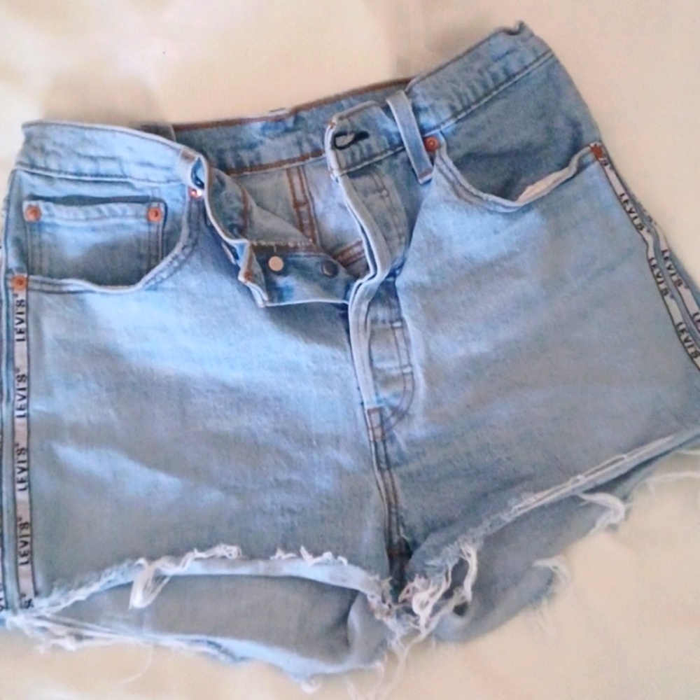 Levi 501, Womens button fly, cutoffs w/Levi name in ribbon on the sides. Sz. 31